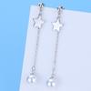 Pendientes de plata de ley s925 Qiao Lanxuan imitación estrella de cinco puntas perla borla de cuentas rojas joyería de oreja larga para mujer estudiante venta al por mayor