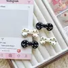 Pinza para el pelo corta de lunares blancos y negros con lazo para niñas pequeñas, accesorio simple para flequillo lateral, tocado versátil y dulce