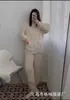 Pijama de Lã Coral Feminino Inverno Espessado Roupa Externa Fofa Flanela Roupa de Casa Moda Solta Cardigan Longo Conjunto