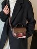 Bolso de silla de montar a cuadros de nicho para mujer 2023 nueva moda de otoño e invierno bandolera bandolera para el día a día