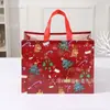 Saco de presente de Natal para comércio exterior saco não tecido revestido impressão colorida grande sacola de compras portátil em estoque atacado personalizado