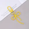 Nuevo Colgante de Hebilla de Puerta con Lazo Hueco Accesorios de Material DIY Llavero Hebilla de Puerta Hebilla Decorativa Mochila Colgante Pequeño