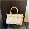 Bolsa de Mão Nova de Design Nicho para a Primavera de 2026 Bolsa de Mão Fashion Casual Branca Versátil Bolsa Transversal para o Dia a Dia para Mulheres