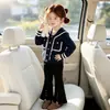 Ropa de Otoño para Niñas Transfronteriza Suéter con Cuello Marino Conjunto de Pantalones Negros de Microcampana Nuevo Conjunto de Dos Piezas Campus 2026 Ropa Infantil de Moda
