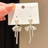 Pendientes de perla con aguja de plata, circonita, lazo de aceite y múltiples formas de llevar, pendientes dulces y versátiles con un toque de lujo ligero y alta gama