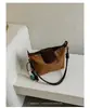 Bolsa de hombro tipo bolsa de dumplings de gran capacidad transfronteriza para mujer, nuevo modelo 2026, bolso cruzado de moda casual versátil de alta gama