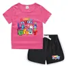 Conjunto de Camiseta e Shorts de Gola Redonda de Verão 2026 para Crianças Estilo Coreano Casual Absorvente de Suor Cor Doce Conjunto de Moletom para Crianças Pequenas