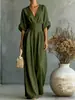 Elegante y moderno mono de mujer con pantalones de pierna ancha, cintura alta, cintura ceñida y mangas enrolladas, adecuado para vacaciones, para ir al trabajo y para el uso diario