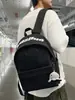 Nova Mochila Escolar Ensino Fundamental Médio Faculdade Bolsa de Ombro Dupla Mochila Casual de Grande Capacidade Transfronteiriça Duplo Ombro Feminina de Alto Padrão Nicho