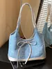 Bolsa jeans feminina 2026 nova tendência moda bolsa de ombro única bolsa tote de grande capacidade para escola e trabalho