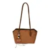 Bolsa de axila casual retrô simples estilo coreano para mulheres, novo modelo 2026, bolsa de ombro versátil texturizada, bolsa de grande capacidade para o dia a dia