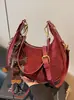 Bolso de axila tipo 'dumpling' de nicho francés de alta gama transfronterizo para mujer, nuevo bolso de mano de moda, bolso de hombro versátil de estilo extranjero