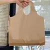 Tienda de Ropa de Alta Gama Bolsas de Plástico Gruesas con Agujero Redondo para Compras Bolsas de Regalo Empaque de Ropa Bolsas de Empaque Hechas a Medida