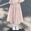 Conjunto de dos piezas para niña: una sudadera con cuello de muñeca y una falda midi de moda con lazo, perfecta para principios de otoño, adecuada para la escuela