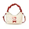 Bolso de mano de gato dulce y lindo estilo coreano, un bolso cruzado mini y único para madres e hijas, con un diseño plisado y una sensación moderna, ligera y lujosa.