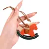 Pingente de Bolsa Cavalo de Balanço Criativo Retro Fofo Charme de Cavalo de Madeira PU Acessório Chaveiro Cavalo do Ano em Couro