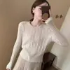 Design de afinar a cintura, blusa base de malha com gola redonda, nova coleção de outono, conjunto estiloso de top e saia de tricô