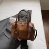 Bolsa de Mão de Alta Aparência Estilo Coreano Bolsa Bowling para Mulheres Nova Moda Primavera 2026 Bloqueio de Cores Bolsa de Ombro Transversal de Nicho