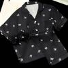 Pijama de verano con estampado de mariposa plateada transfronterizo, pantalones cortos de seda helada de manga corta, traje para dormitorio de estudiante, foto real, venta al por mayor