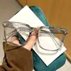 Nueva caja de gafas transparentes para estudiantes, miopía, hombres y mujeres, gafas planas de cara redonda grande con marco anti-luz azul, venta al por mayor