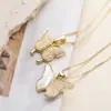 Aogu Moda Transfronteriza Lujo Accesible Chapado en Cobre Oro de 18 Quilates Circonita Colgante de Mariposa Collar para Mujer Nicho Gama Alta Versátil