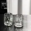 Conjunto de copos de vidro resistentes ao calor para uso doméstico, apresentando um design simples, moderno e elegante, incluindo copos de vidro, copos de água e taças de vinho, todos em cor transparente