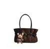 Bolsa Tote Estampa de Leopardo para o Trabalho Feminina 2026 Outono/Inverno Nova Elegante Moderna de Ombro Único Grande Capacidade Bolsa de Mão para Trabalho