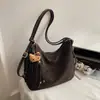 Bolsa Feminina Nova Estilo Coreano Vintage Moda Primavera 2026 Bolsa de Ombro para o Trabalho Bolsa de Mão de Nicho Bolsa Tote Vintage