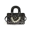 Bolsa de mano para niña estilo europeo y americano, nueva para primavera y verano, con lentejuelas para padres e hijos, bolso de mano de perlas para niños, bolso estilo occidental para mujer