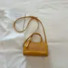 2026 Verano Versión Coreana Casual Bolso Almohada de Mano Nuevo Patrón Tejido Bolso de Mujer Alta Estética Cruzado Hombro Mochila Pequeña