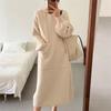Vestido suéter de largo medio con capucha para mujer, nuevo estilo otoño e invierno 2025, vestido suéter de punto holgado, vestido interior, engrosado