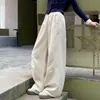 Calça de moletom para meninas 2026 Outono Novo Estilo Crianças Médias e Grandes Casual Patchwork Calça de Foice Cor Sólida Calça de Perna Larga Primavera e Outono Calças Longas