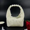 Bolsa de contas, bolsa de miçangas, bolsa artesanal, contas prateadas, textura metálica, toque de luxo, versátil, retrô, trançada, bolsa de mão trançada