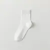 Meias de cano médio sem costura masculinas primavera e verão algodão puro cor sólida cano longo meias masculinas rede esportiva absorvente de suor desodorante japonesa atacado