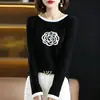 Camiseta de punto jacquard romántica nueva de primavera para mujer, top elegante de manga corta con bloques de color, nuevo color de camelia
