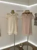 WGWE10021 Guangzhou Treze Hong Roupas Femininas 2026 Chegada de Verão Gola Lapela Renda Solto Manga Curta Vestido Mini