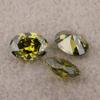 Wuzhou circonita cúbica artificial ovalada en forma de huevo verde oliva circonio venta al por mayor circonita piedra desnuda anillo cara gema CZ piedra a juego