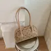 Bolso de hombro de moda estilo coreano Ruien con lunares 2026 otoño nuevo de gran capacidad para el trabajo bolso Boston exquisito