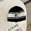 Otoño e Invierno nuevo estilo coreano negro y blanco color de contraste tejido cálido gorro para el frío hombres y mujeres pareja moda protección para los oídos moda gorro de lana