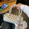 Nova Bolsa de Mão Coreana Primavera/Verão com Toque de Luxo, Bolinhas, Design de Moda Preto de Nicho, Bolsa de Ombro Versátil para Mulheres