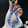 Cadena de Teléfono de Mariposa Acrílica Colorida Bola de Flores Cuentas de Cristal Cadena Colgante Estilo Pulsera Funda de Teléfono con Cuentas Lanyard para Mujeres Venta al por Mayor
