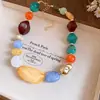 Collar de doble capa con cuentas acrílicas transfronterizo europeo y americano, cadena para la clavícula de lujo ligero de alta gama, joyería de estilo étnico vintage al por mayor