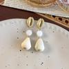 Pendientes de madera con forma de gota de agua de gran venta transfronteriza, de alta gama, ligeros, de lujo, de nicho, de estilo étnico famoso, pendientes distintivos, pendientes Ins.