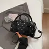 Bolsa elegante para mulheres 2026 nova bolsa feminina estilosa e da moda versão coreana bolsa de ombro texturizada bolsa transversal versátil