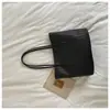 2026 Outono Inicial Nova Bolsa Tote de Mão com Textura Trançada Grande Capacidade Bolsa de Ombro Única Simples Retrô Bolsa Tote de Mão para o Trabalho