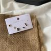 Aguja de Plata 925 Estilo Coreano Simple Combinación de Aretes de Tuerca Frescos en Oro Negro para Combinar Aretes de Moda Cobre