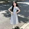 Conjunto de Saia Plissada de Manga Curta para Meninas 2026 Novo Verão Infantil Desenho Animado Gola Boneca Camiseta Meia Saia Estilo Doce 8