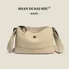 Bolsa Transversal de Nylon Impermeável Leve Casual Multicamadas Feminina 2024 Inverno Novo Estilo Simples Moderna Bolsa de Ombro de Alça Larga