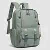 Nova mochila transfronteiriça, cor sólida, casual, simples, leve, bolsa para laptop, mochila de viagem para esportes ao ar livre estilo floresta