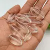 Fábrica de origen cuentas lisas en forma de arroz, cuentas de vidrio de alta transparencia, procesamiento personalizado 12*30 cuentas de cristal liso ovaladas tipo aceituna